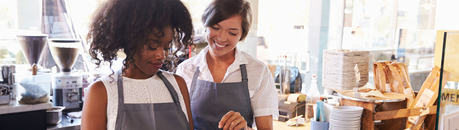 Women working at cafe.